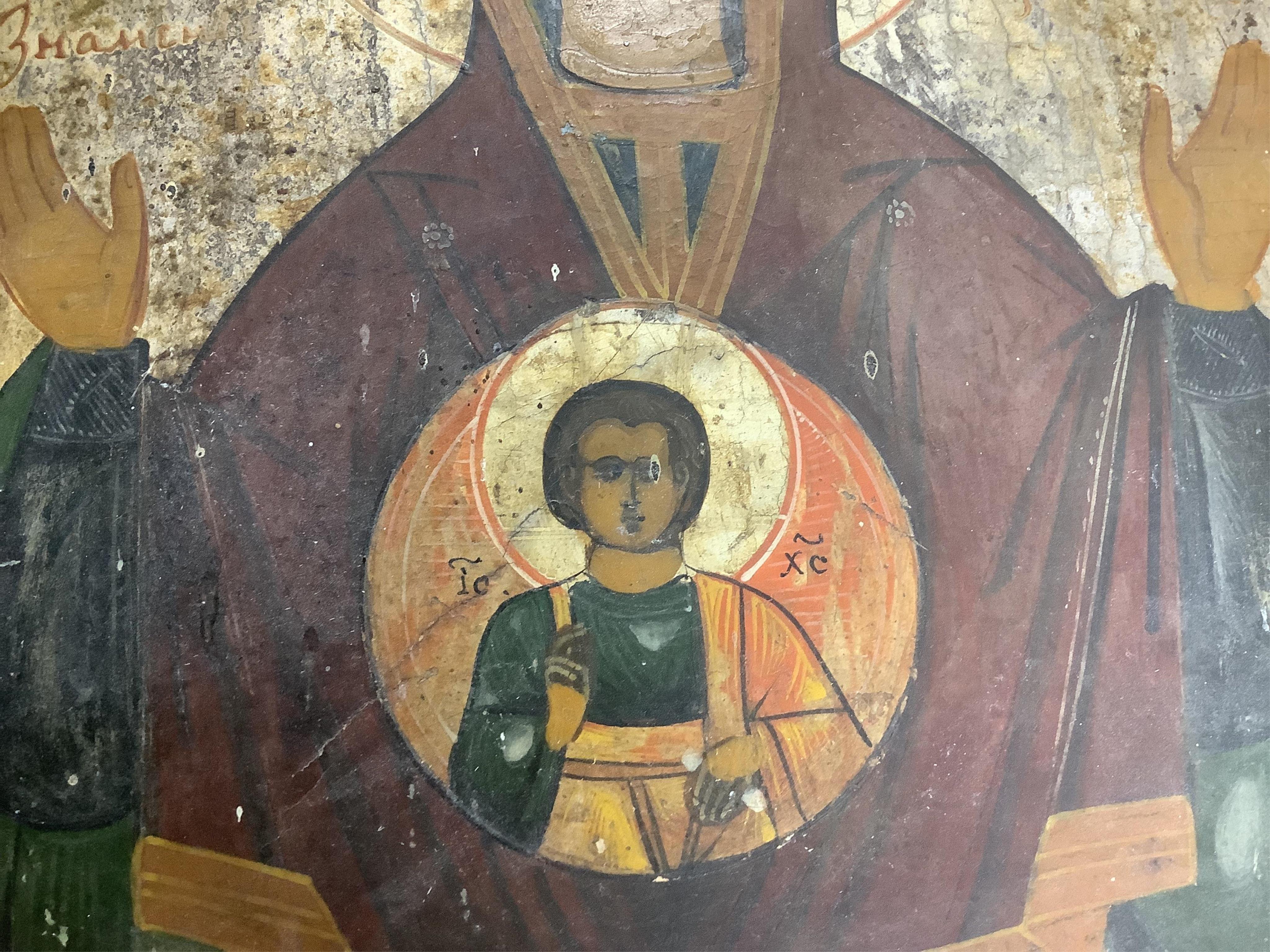 A 19th century Greek painted wood icon of Madonna and child, 31cm high